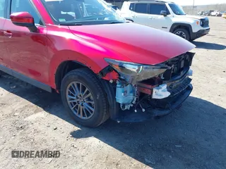 2019 Mazda CX-5 Sport with VIN JM3KFBBM6K1596402, listed as a IAAI auction lot 41971766 with 60,396 mi miles and . Bid and sale history available at DreamBid. Image 20.