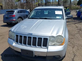 2010 Jeep Grand Cherokee Laredo with VIN 1J4PR4GKXAC141526, listed as a IAAI auction lot 41997559 with 0 mi miles. Bid and sale history available at carsss.com. Image 6.