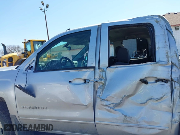 2018 Chevrolet Silverado 1500 LT with VIN 1GCVKREC8JZ237565, listed as a IAAI auction lot 42052619 with 92,790 mi miles and . Bid and sale history available at DreamBid. Image 14.