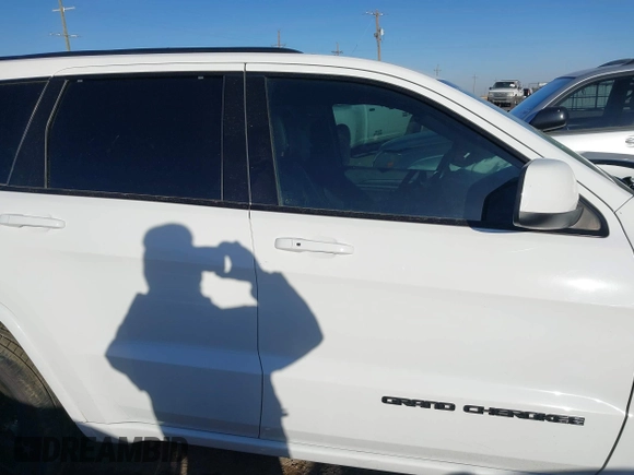 2021 Jeep Grand Cherokee Laredo X with VIN 1C4RJEAG6MC658195, listed as a IAAI auction lot 41414668 with 52,488 mi miles and . Bid and sale history available at DreamBid. Image 14.