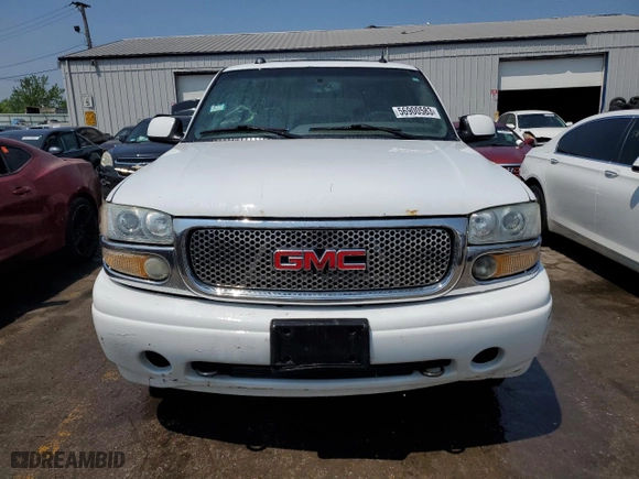 2005 GMC Yukon Denali with VIN 1GKEK63U75J123561, listed as a Copart auction lot 56900583 with 0 mi miles and Salvage Title. Bid and sale history available at carsss.com. Image 5.