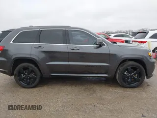 2016 Jeep Grand Cherokee High Altitude with VIN 1C4RJFCG7GC316309, listed as a IAAI auction lot 41557459 with 144,700 mi miles. Bid and sale history available at carsss.com. Image 13.