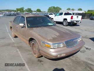 1996 Mercury Grand Marquis GS with VIN 2MELM74W3TX670994, listed as a IAAI auction lot 42052604 with 46,728 mi miles and . Bid and sale history available at DreamBid. Image 1.