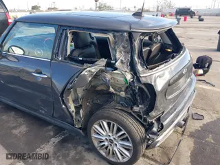 2015 MINI Cooper Hardtop S with VIN WMWXP7C59F2A60317, listed as a IAAI auction lot 41703020 with NaN miles. Bid and sale history available at carsss.com. Image 6.