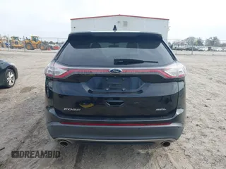 2016 Ford Edge SEL z VIN 2FMPK3J88GBC31800, wystawiony jako IAAI lot #41792533 z przebiegiem 156 379 mil mil oraz . Historia ofert i sprzedaży dostępna na DreamBid. Obrazek 17.