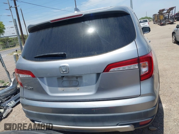 2020 Honda Pilot EX-L z VIN 5FNYF5H52LB007696, wystawiony jako IAAI lot #42065587 z przebiegiem 74 781 mil mil oraz . Historia ofert i sprzedaży dostępna na DreamBid. Obrazek 17.