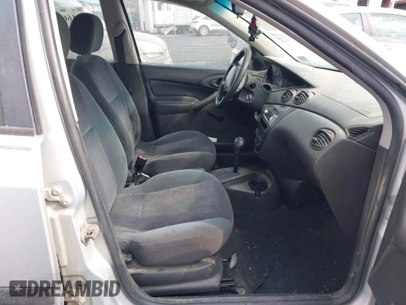 2001 Ford Focus LX with VIN 1FAFP33P31W297608, listed as a IAAI auction lot 41663965 with 142,898 mi miles and . Bid and sale history available at carsss.com. Image 5.