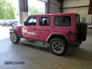 2022 Jeep Wrangler Unlimited Sahara with VIN 1C4HJXEN0NW106045, listed as a Copart auction lot 52383455 with 104,937 mi miles and Salvage title. Bid and sale history available at DreamBid. Image 2.