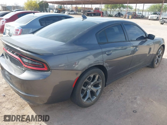 2015 Dodge Charger SXT with VIN 2C3CDXHG4FH890684, listed as a IAAI auction lot 41896958 with 118,140 mi miles and . Bid and sale history available at DreamBid. Image 4.