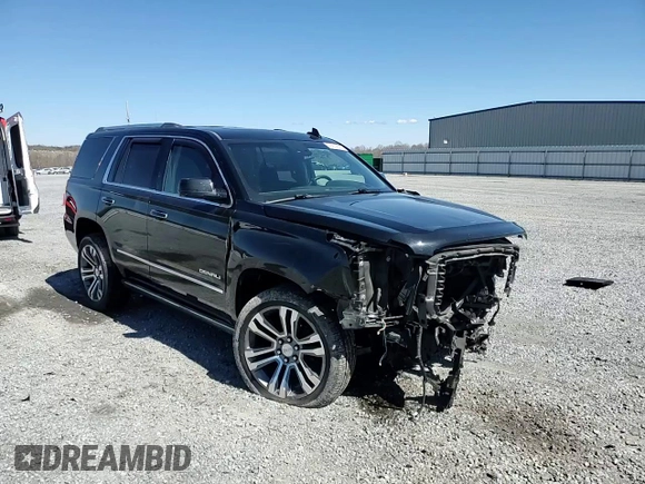2015 GMC Yukon Denali with VIN 1GKS2CKJ5FR612147, listed as a Copart auction lot 49209525 with 127,262 mi miles and Salvage Title. Bid and sale history available at carsss.com. Image 12.