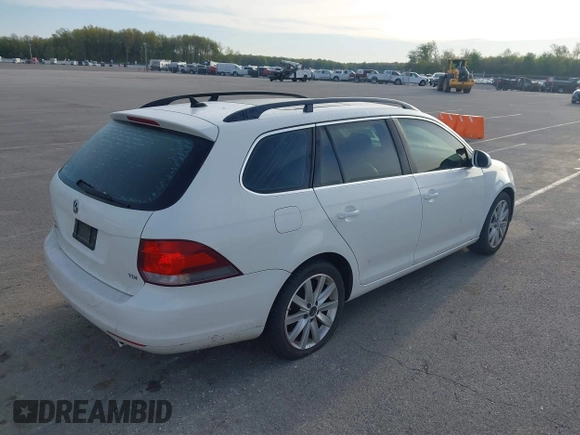 2011 Volkswagen Jetta SportWagen TDI with VIN 3VWPL7AJ7BM702061, listed as a IAAI auction lot 42088506 with 243,200 mi miles. Bid and sale history available at carsss.com. Image 4.