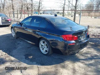 2013 BMW 5 Series 550i xDrive with VIN WBAFU9C52DDY70807, listed as a IAAI auction lot 41902163 with 92,021 mi miles and . Bid and sale history available at carsss.com. Image 3.