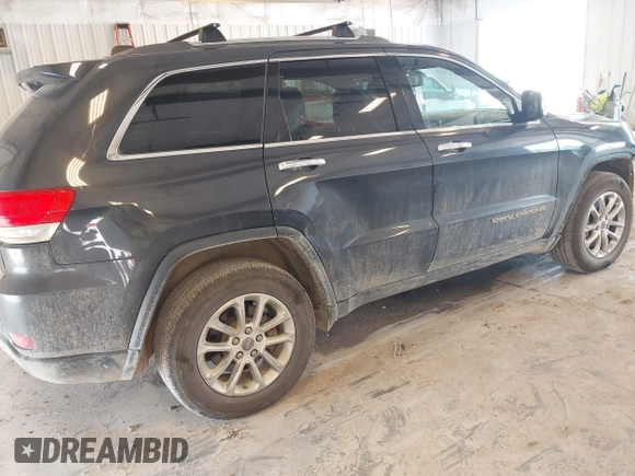 2014 Jeep Grand Cherokee Limited with VIN 1C4RJFBT6EC151557, listed as a IAAI auction lot 42691102 with 204,462 mi miles and . Bid and sale history available at DreamBid. Image 4.