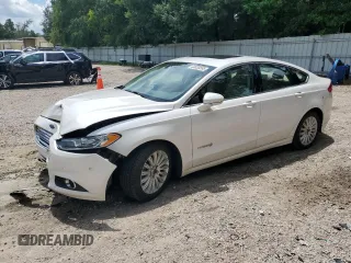 2015 Ford Fusion SE Hybrid with VIN 3FA6P0LU1FR210884, listed as a Copart auction lot 60035595 with 125,798 mi miles and Salvage title. Bid and sale history available at DreamBid. Image 1.