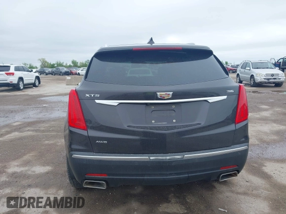 2017 Cadillac XT5 Luxury AWD z VIN 1GYKNDRS9HZ184992, wystawiony jako IAAI lot #41958484 z przebiegiem 124 941 mil mil oraz . Historia ofert i sprzedaży dostępna na DreamBid. Obrazek 16.