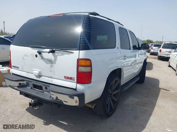 2003 GMC Yukon SLT with VIN 1GKEC13Z33R156583, listed as a IAAI auction lot 41831947 with 156,309 mi miles. Bid and sale history available at carsss.com. Image 4.