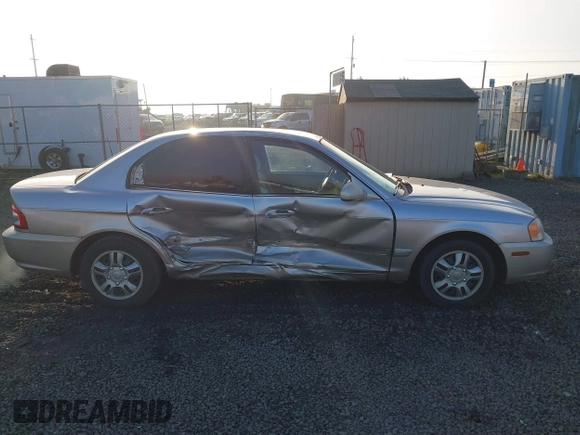 2004 Kia Optima LX z VIN KNAGD126045302372, wystawiony jako IAAI lot #41022315 z przebiegiem 199 588 mil mil oraz . Historia ofert i sprzedaży dostępna na DreamBid. Obrazek 14.