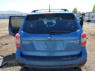 2015 Subaru Forester XT Touring with VIN JF2SJGWC7FH448103, listed as a IAAI auction lot 42182003 with 157,272 mi miles and . Bid and sale history available at DreamBid. Image 16.