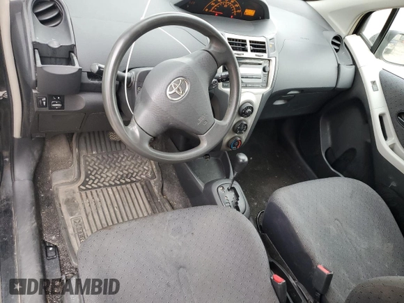 2010 Toyota Yaris z VIN JTDJT4K37A5290297, wystawiony jako Copart lot #56980175 z przebiegiem 459 391 mil mil oraz Czysty tytuł • Clean title. Historia ofert i sprzedaży dostępna na DreamBid. Obrazek 8.