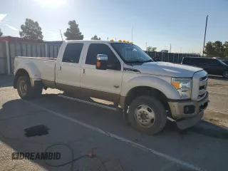 2014 Ford F-450 XL with VIN 1FT8W4DT4EEA08741, listed as a Copart auction lot 77214904 with 168,838 mi miles and Salvage title. Bid and sale history available at DreamBid. Image 4.