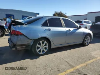 2004 Acura TSX w/Navigation z VIN JH4CL95924C011519, wystawiony jako Copart lot #87966825 z przebiegiem 213 023 mil mil oraz Szkoda całkowita • Salvage title. Historia ofert i sprzedaży dostępna na DreamBid. Obrazek 3.