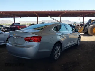 2017 Chevrolet Impala LT with VIN 1G1105S38HU210996, listed as a IAAI auction lot 42294290 with 96,250 mi miles and . Bid and sale history available at DreamBid. Image 4.
