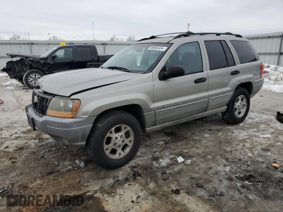 2000 Jeep Grand Cherokee Laredo z VIN 1J4GW48S8YC335926, wystawiony jako Copart lot #80693454 z przebiegiem 353 635 mil mil oraz Nie do naprawy • Non repairable. Historia ofert i sprzedaży dostępna na DreamBid. Obrazek 1.