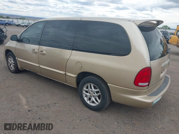 2000 Dodge Caravan SE z VIN 1B4GP44G6YB798882, wystawiony jako IAAI lot #42260881 z przebiegiem 195 020 mil mil oraz . Historia ofert i sprzedaży dostępna na DreamBid. Obrazek 3.