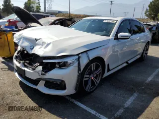 2018 BMW 7 Series 740i with VIN WBA7E2C5XJB214886, listed as a Copart auction lot 57833143 with 39,975 mi miles. Bid and sale history available at carsss.com. Image 1.