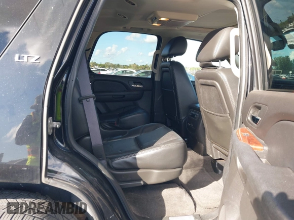 2012 Chevrolet Tahoe LTZ with VIN 1GNSKCE04CR218348, listed as a IAAI auction lot 41541342 with 96,365 mi miles and . Bid and sale history available at DreamBid. Image 8.