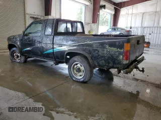 1986 Nissan Hardbody E z VIN 1N6ND16Y7GC413942, wystawiony jako Copart lot #57677605 z przebiegiem 126 183 mil mil oraz Tytuł czysty. Historia ofert i sprzedaży dostępna na DreamBid. Obrazek 2.