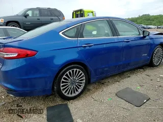 2017 Ford Fusion Hybrid Titanium with VIN 3FA6P0RU1HR138725, listed as a Copart auction lot 56650625 with 77,331 mi miles and Salvage title. Bid and sale history available at DreamBid. Image 13.