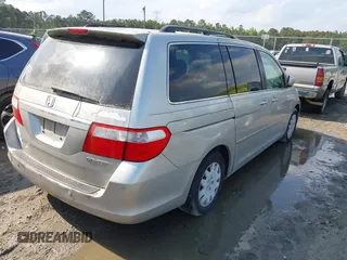 2005 Honda Odyssey TOURING with VIN 5FNRL38875B005926, listed as a IAAI auction lot 42007315 with 1 mi miles. Bid and sale history available at carsss.com. Image 4.