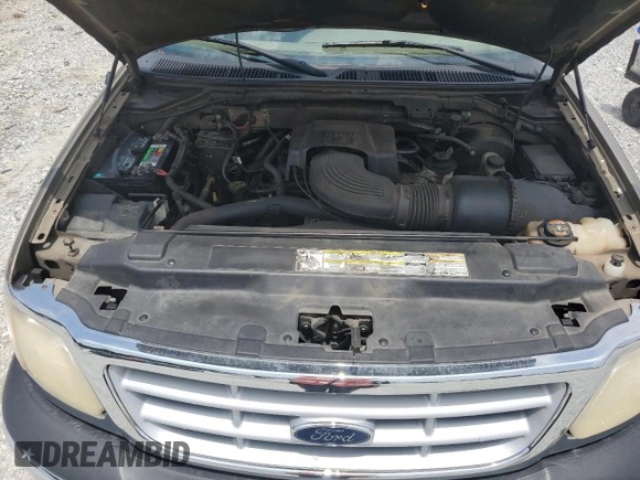 2001 Ford F-150 XLT z VIN 1FTRW07L81KF68346, wystawiony jako Copart lot #57460445 z przebiegiem Nie podano mil oraz Szkoda całkowita • Salvage title. Historia ofert i sprzedaży dostępna na DreamBid. Obrazek 11.