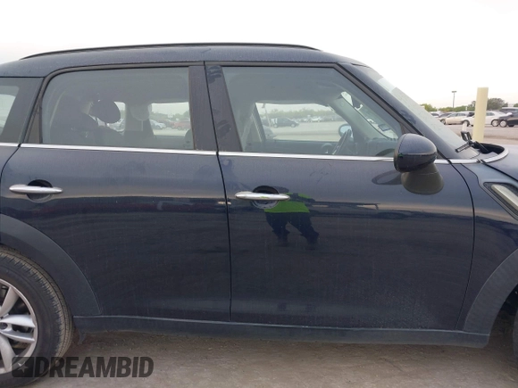 2013 MINI Countryman S with VIN WMWZC3C59DWP24390, listed as a IAAI auction lot 42038509 with 134,903 mi miles and . Bid and sale history available at DreamBid. Image 14.