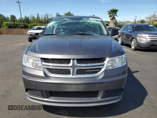 2014 Dodge Journey SE with VIN 3C4PDCABXET308940, listed as a Copart auction lot 52049255 with 119,955 mi miles and Salvage Title. Bid and sale history available at carsss.com. Image 5.