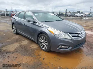 2013 Hyundai Azera with VIN KMHFG4JG7DA240540, listed as a IAAI auction lot 41816305 with 205,940 mi miles. Bid and sale history available at carsss.com. Image 1.