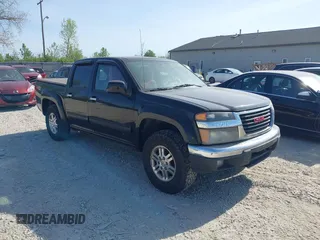 2011 GMC Canyon SLE1 with VIN 1GTH6MFE5B8104838, listed as a IAAI auction lot 42120959 with 188,277 mi miles. Bid and sale history available at carsss.com. Image 1.