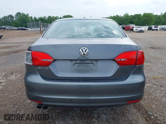 2013 Volkswagen Jetta S z VIN 3VW2K7AJ5DM369293, wystawiony jako IAAI lot #42172959 z przebiegiem 170 983 mil mil oraz . Historia ofert i sprzedaży dostępna na DreamBid. Obrazek 16.