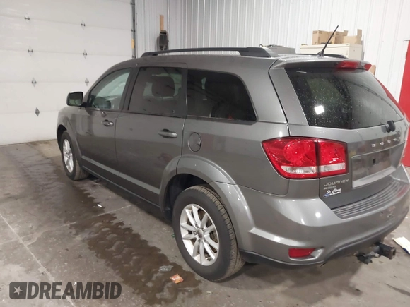 2013 Dodge Journey SXT with VIN 3C4PDDBG4DT600078, listed as a IAAI auction lot 42060076 with 167,943 mi miles and . Bid and sale history available at DreamBid. Image 3.