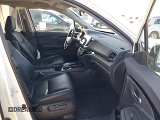 2022 Honda Pilot Touring 7-Passenger with VIN 5FNYF6H67NB017660, listed as a IAAI auction lot 41194603 with 87,301 mi miles. Bid and sale history available at carsss.com. Image 5.