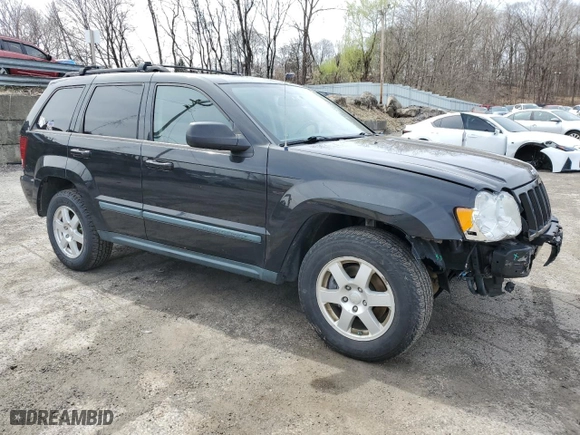 2009 Jeep Grand Cherokee Laredo with VIN 1J8GR48K79C537213, listed as a Copart auction lot 51222395 with 148,838 mi miles and Salvage Title. Bid and sale history available at carsss.com. Image 4.