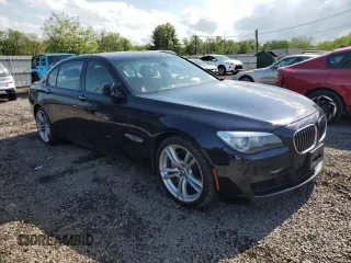 2014 BMW 7 Series 740Li xDrive z VIN WBAYF4C58ED281817, wystawiony jako Copart lot #55755815 z przebiegiem 112 398 mil mil oraz Szkoda całkowita • Salvage title. Historia ofert i sprzedaży dostępna na DreamBid. Obrazek 4.