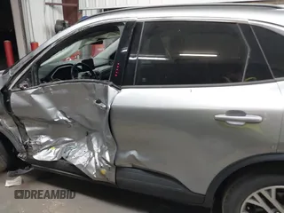 2021 Ford Escape SEL with VIN 1FMCU9H67MUA94970, listed as a IAAI auction lot 42317086 with 51,769 mi miles and . Bid and sale history available at DreamBid. Image 14.