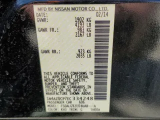 2014 Nissan LEAF SL with VIN 1N4AZ0CP7EC334248, listed as a Copart auction lot 52198325 with 57,659 mi miles and Salvage Title. Bid and sale history available at carsss.com. Image 14.