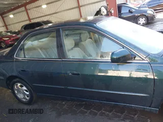 2000 Honda Accord EX z VIN 1HGCG6674YA149566, wystawiony jako IAAI lot #41368271 z przebiegiem 262 505 mil mil oraz . Historia ofert i sprzedaży dostępna na DreamBid. Obrazek 14.
