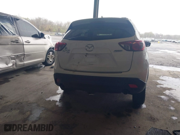 2014 Mazda CX-5 Touring with VIN JM3KE4CY9E0370610, listed as a IAAI auction lot 42016896 with 72,340 mi miles. Bid and sale history available at carsss.com. Image 15.