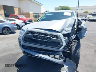 2020 Toyota Tacoma SR5 with VIN 3TMBZ5DN7LM025500, listed as a IAAI auction lot 42651731 with 54,879 mi miles and . Bid and sale history available at DreamBid. Image 13.