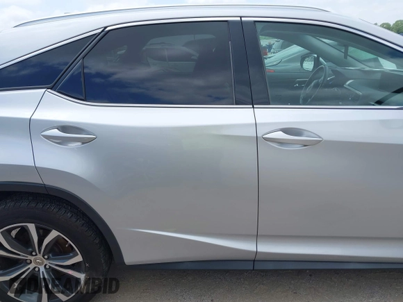 2017 Lexus RX 350 z VIN 2T2BZMCA5HC055423, wystawiony jako IAAI lot #42374119 z przebiegiem 159 073 mil mil oraz . Historia ofert i sprzedaży dostępna na DreamBid. Obrazek 13.
