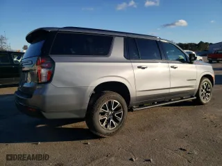 2022 Chevrolet Suburban Z71 with VIN 1GNSKDKD8NR117510, listed as a Copart auction lot 80980744 with 77,519 mi miles and Salvage Title. Bid and sale history available at carsss.com. Image 3.